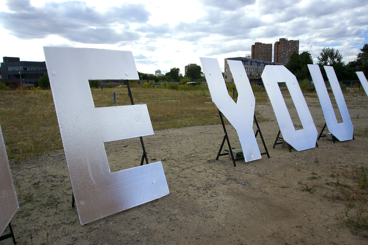 7FT silver letters that read Made you look behind the Museum of Contemporary Arts